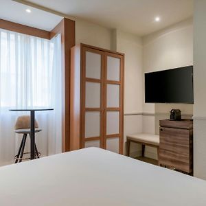 Habitación Estándar con Cama Queen